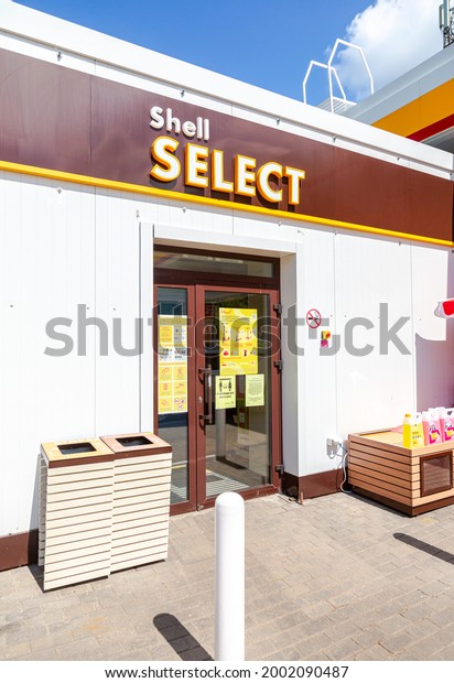 Samara, Russia - July 4, 2021: A Shell Select\
storefront at Shell gas station. Royal Dutch Shell is an\
Anglo-Dutch multinational oil and gas\
company