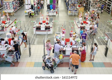 SAMARA, RUSSIA - JULY 7: Shoppers at the checkout lane Auchan hypermarket, July 7, Samara. In Russia there are more than a hundred stores Auchan