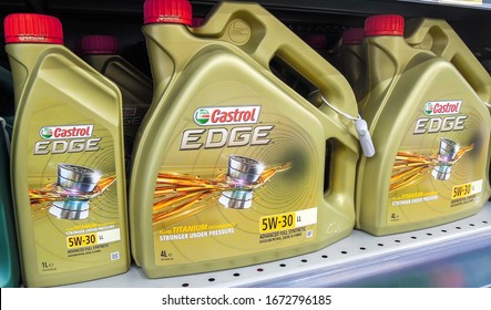 Samara, Russia - March 7, 2020: Castrol Edge motor oil in plastic canisters on the shelf at the superstore