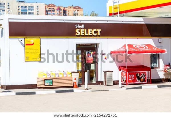 Samara, Russia - May 07, 2022: Shell Select\
storefront at Shell gas station. Royal Dutch Shell is an\
Anglo-Dutch multinational oil and gas\
company