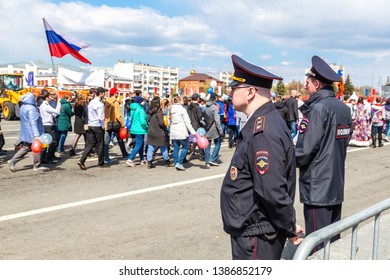 Samara, Russia - May 1, 2019: Unidentified Russian Policemans In Uniform Watching The Rule Of Law During The Demonstration On Labor Day. Text In Russian: Police