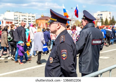 Samara, Russia - May 1, 2019: Unidentified Russian Policemans In Uniform Watching The Rule Of Law During The Demonstration On Labor Day. Text In Russian: Police