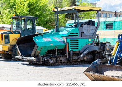 Samara, Russia - May 13, 2017: Vogele asphalt paver machine on the road repair site. Road construction machinery