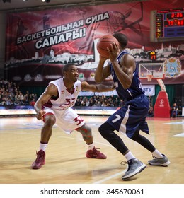 SAMARA, RUSSIA - OCTOBER 22: Cory Higgins Of BC Triumph With Ball Goes Against A BC Krasnye Krylia Player On October 22, 2013 In Samara, Russia.