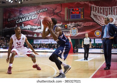 SAMARA, RUSSIA - OCTOBER 22: Cory Higgins Of BC Triumph With Ball Goes Against A BC Krasnye Krylia Player On October 22, 2013 In Samara, Russia.