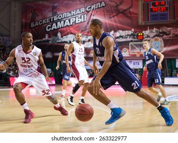 SAMARA, RUSSIA - OCTOBER 22: Jeremy Chappell Of BC Triumph With Ball Goes Against A BC Krasnye Krylia Player On October 22, 2013 In Samara, Russia.