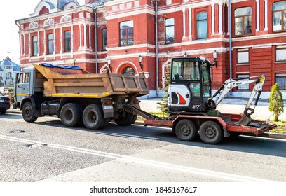 Samara, Russia - October 29, 2020: Transportation Of Small Backhoe On A Cargo Platform