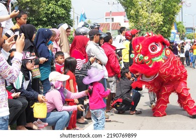 Samarinda, July 11, 2014. Red Barongsai Performance During The Yearly Chinese Festival On The Street City Act