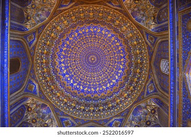 Samarkand, Uzbekistan - Sept 10, 2024: Dome ceiling decoration in Tilya-Kori Madrasah on the Registan square in Samarkand - Powered by Shutterstock