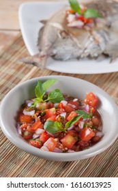 Sambal dabu-dabu is kind of chili sauce from Manado, North Sulawesi province, similar to Mexican salsa sauce, made from tomatoes, salt, basil, musk oranges and chili