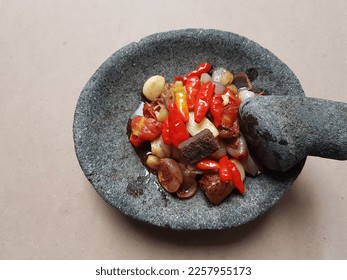 Sambal is one of the special elements of Indonesian dishes. Sambal is also found in South Asian and East Asian cuisines. - Shutterstock ID 2257955173