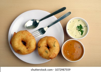 Sambar Wada A South Indian Food On Wooden Background, Top View
