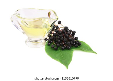 Sambucus (Elder Or Elderberry) Essential Oil Extract In A Glass Container. Isolated On White Background.