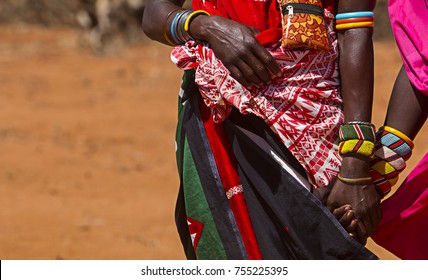 Samburu Women holding hands in Tribal Attire  - Powered by Shutterstock