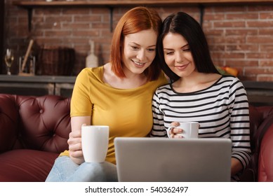 Same Sex Couple Drinking Tea