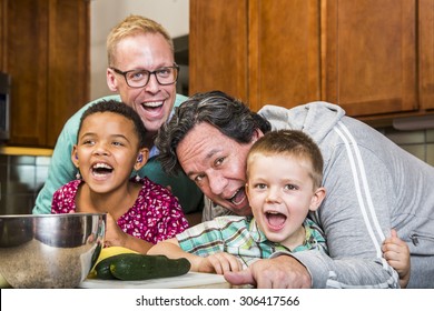 Same Sex Couple And Kids Having Fun At Meal Time