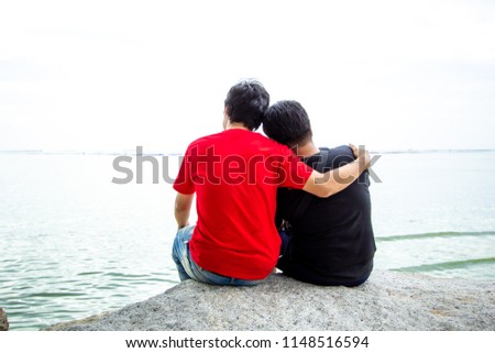 Same Sex Couples Are Passionately At The Beach Gay Same Sex Couples Are Passionately At The Beach Gay