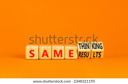 Same thinking and result symbol. Concept words Same thinking same results on wooden cubes. Beautiful orange background. Businessman hand. Business same thinking and result concept. Copy space.