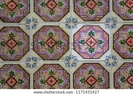 Same tiles, different restoration process, background pattern