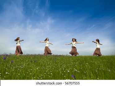 Same Young Woman In Different Positions Dancing On A Beautiful Green Meadow