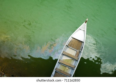 Sampan Heading Out To Sea