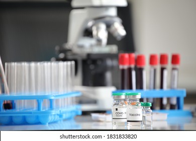 Sample Batch Of Coronavirus Vaccine In Scientific Laboratory Unit Being Test With Blood Sample 