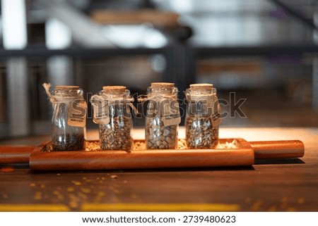 Sample of beer making ingredient material(s) in the glass bottle, using for brewing beer is different taste such as IPA, lager or wheat. Food and object photo, close-up.