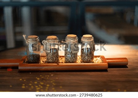 Sample of beer making ingredient material(s) in the glass bottle, using for brewing beer is different taste such as IPA, lager or wheat. Food and object photo, close-up.