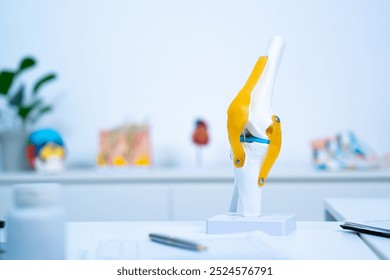 A Sample or model of knee or joint with copy space to explain about osteoarthritis, orthopedics or knee or joint problem. Concept of health care of senior, doctor is explain of symptoms and treatment. - Powered by Shutterstock