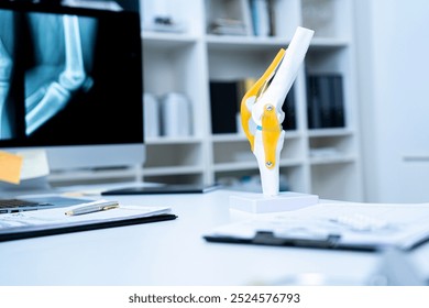 A Sample or model of knee or joint with copy space to explain about osteoarthritis, orthopedics or knee or joint problem. Concept of health care of senior, doctor is explain of symptoms and treatment. - Powered by Shutterstock