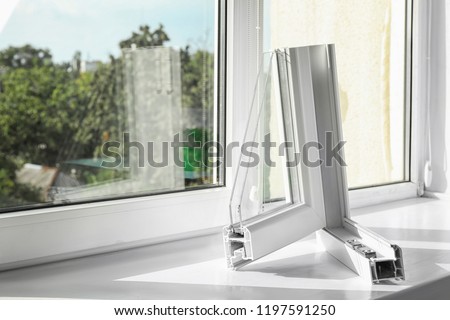Sample of modern window profile on sill. Space for text