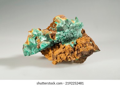 A sample of a natural mineral Malachite (carbonate class) copper carbonate radially radiant aggregate (plate malachite) on lemonite. Museum Mineral Series. Mineralogical sample - Shutterstock ID 2192252481