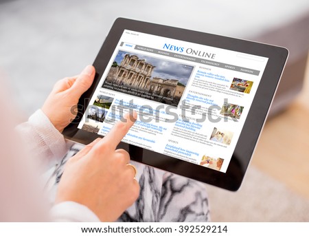 Sample news website on digital tablet. Contents are all made up.