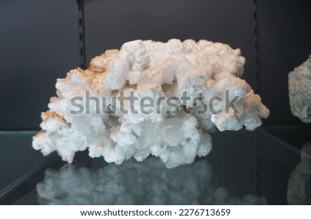 Sample raw of Calcite crystal drusy habit rock in the museum.