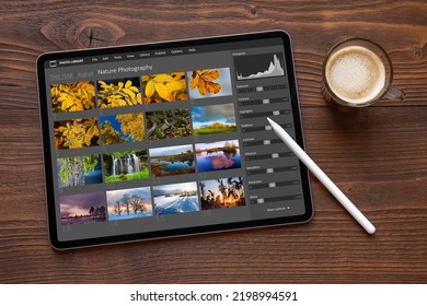 Sample software for viewing and editing photos on tablet computer - Shutterstock ID 2198994591