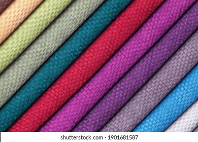 Sample of velvet and velours textile various colors, background. Catalog and swatch tone of Interior fabric for furniture, closeup. Collection of multicolored cloth.