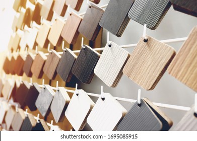 Sample of wood laminate board. Wooden laminate veneer material for interior architecture and construction or furniture finishing design concept - Shutterstock ID 1695085915