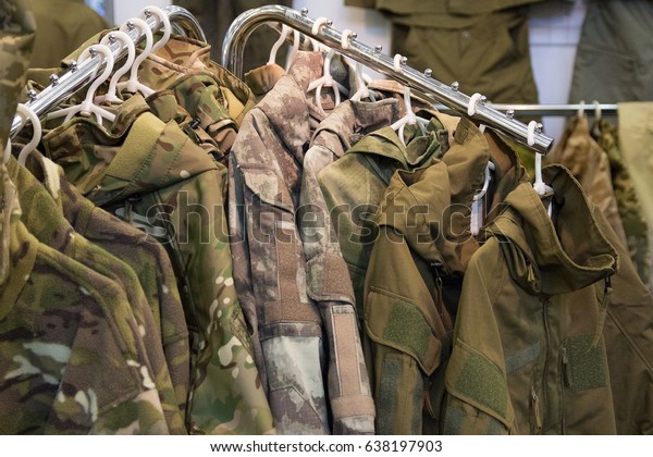 Samples\
camouflage military clothes in the\
store