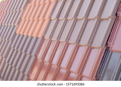 Samples Of Ceramic Roofing Tiles In A Warehouse Of A Roofing Materials Store. Modern Roof Made Of Metal. Cement Sand Tiles.