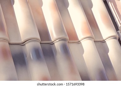 Samples Of Ceramic Roofing Tiles In A Warehouse Of A Roofing Materials Store. Modern Roof Made Of Metal. Cement Sand Tiles.