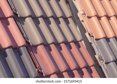 Samples Of Ceramic Roofing Tiles In A Warehouse Of A Roofing Materials Store. Modern Roof Made Of Metal. Cement Sand Tiles.