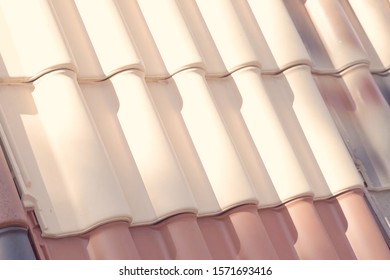 Samples Of Ceramic Roofing Tiles In A Warehouse Of A Roofing Materials Store. Modern Roof Made Of Metal. Cement Sand Tiles.