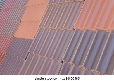 Samples Of Ceramic Roofing Tiles In A Warehouse Of A Roofing Materials Store. Modern Roof Made Of Metal. Cement Sand Tiles.