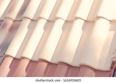 Samples Of Ceramic Roofing Tiles In A Warehouse Of A Roofing Materials Store. Modern Roof Made Of Metal. Cement Sand Tiles.