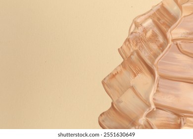 Samples of different mixed foundations on beige background, top view. Space for text