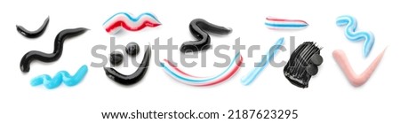 Samples of different tooth paste on white background