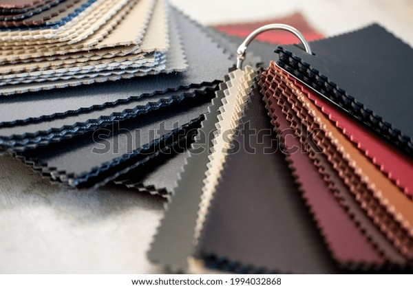 samples of eco-leather, leather close-up,\
selective focus.