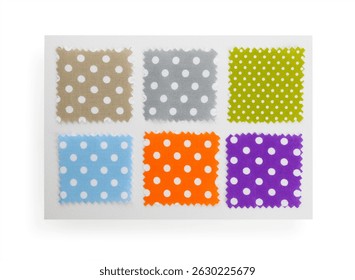 Samples of fabrics with polka dot pattern isolated on white, top view