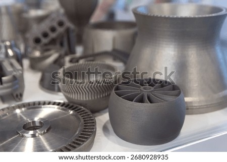 Samples produced by printing a 3D printer from a metal powder. Progressive additive 3d printing technology