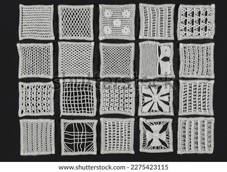 Samples of types of renaissance lace, on a black background, typical of northeastern Brazil.